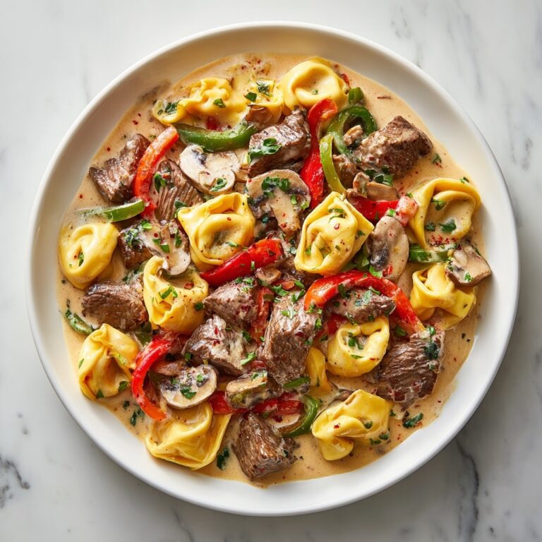 Savory Cheesesteak Tortellini in Creamy Provolone Sauce Recipe