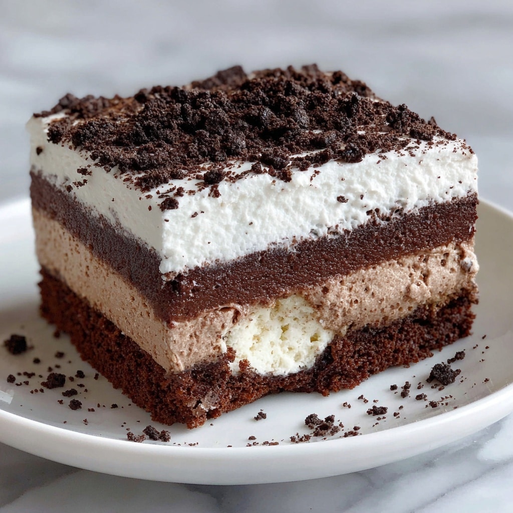 Oreo Pudding Poke Cake Recipe - Recipe Image