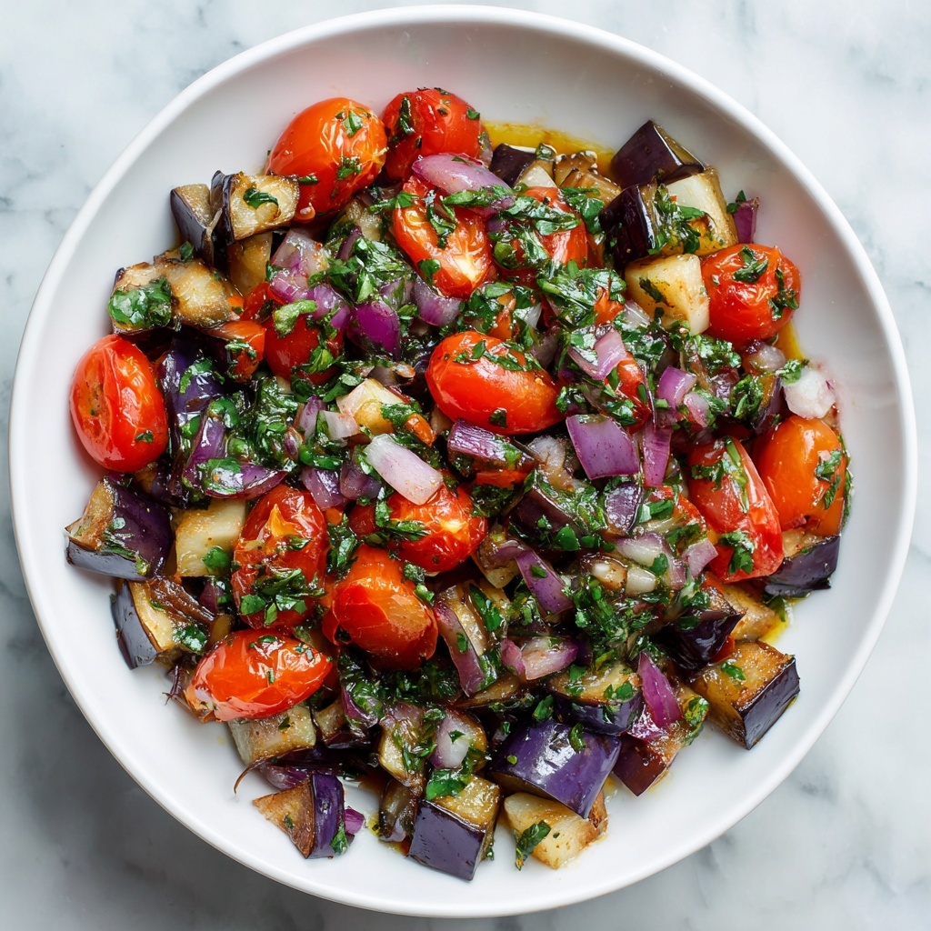 Roasted Eggplant Salad with Cherry Tomatoes, Red Onion, and Fresh Basil Recipe - Recipe Image