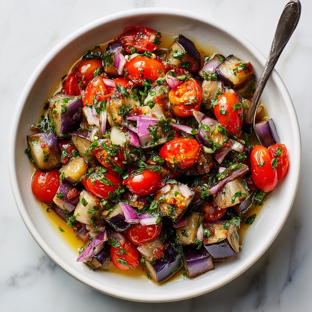 Roasted Eggplant Salad with Cherry Tomatoes, Red Onion, and Fresh Basil Recipe - Recipe Image