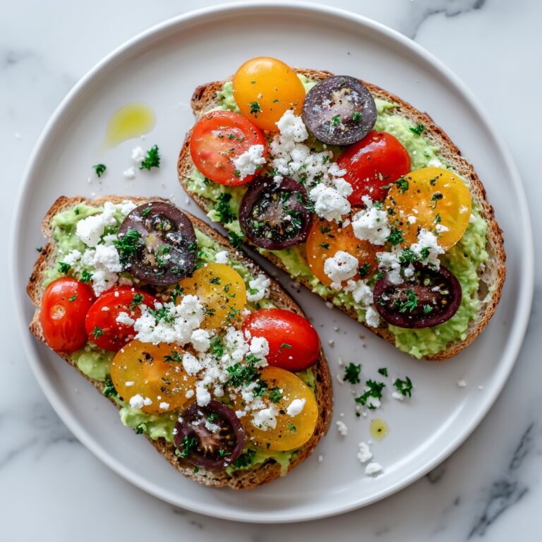 Avocado Toast with Feta, Cherry Tomatoes, Cranberries, and Walnuts Recipe