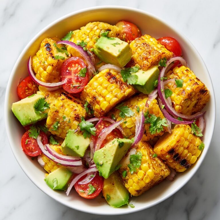 Grilled Corn Steak Salad with Cherry Tomatoes, Avocado, and Cilantro Recipe