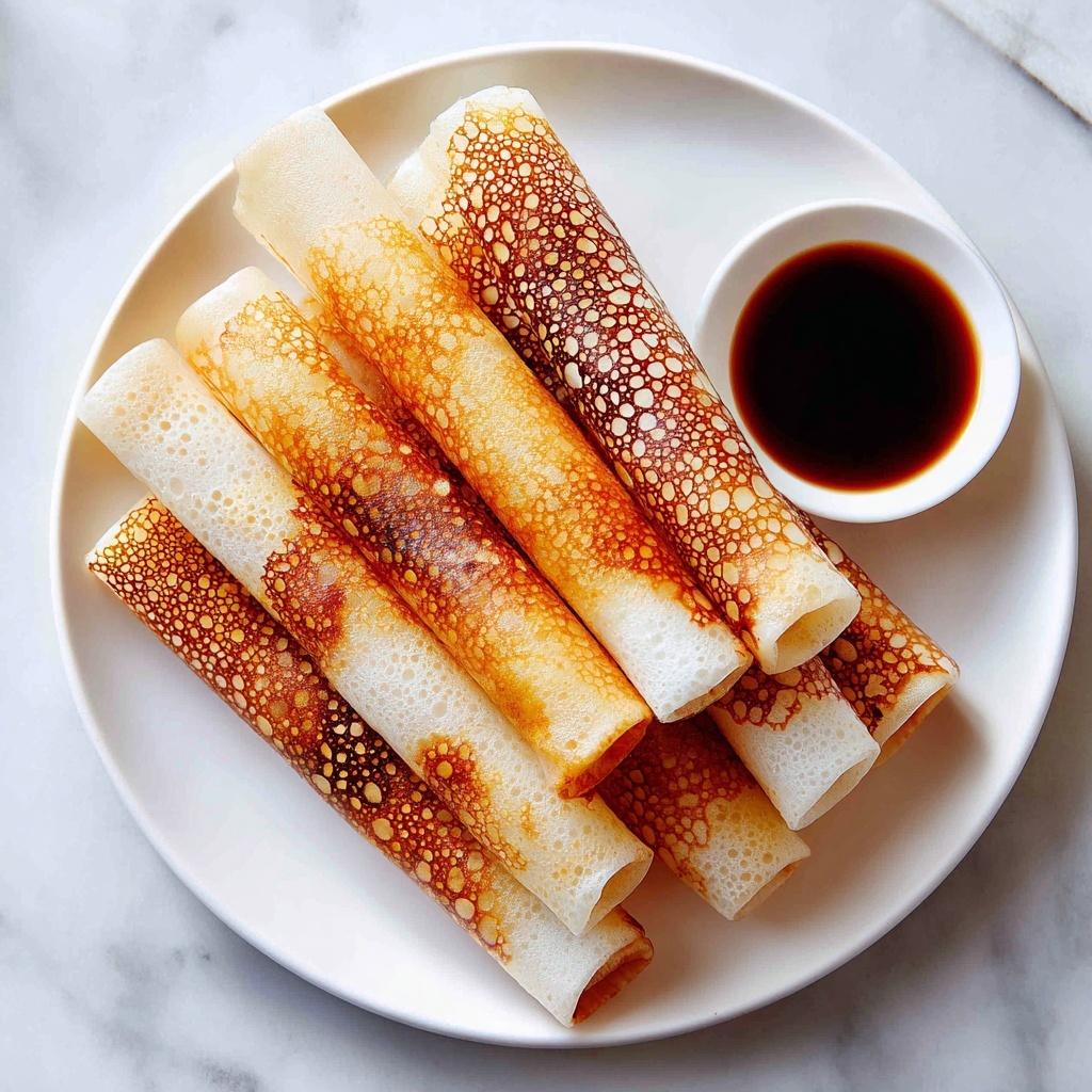 Sausage-Stuffed French Toast Roll-Ups Recipe - Recipe Image